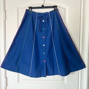 Vintage A line skirt with built in belt and colored piping with matching buttons